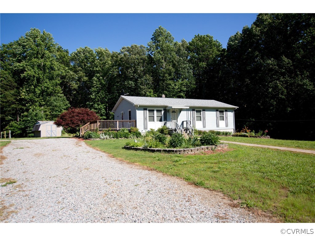 9361 West Bunker Hill Road Rice, VA 23966 - Photo 1 of 39 a front view of a house with a yard