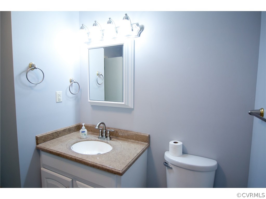 9361 West Bunker Hill Road Rice, VA 23966 - Photo 15 of 39 a bathroom with a sink and a mirror
