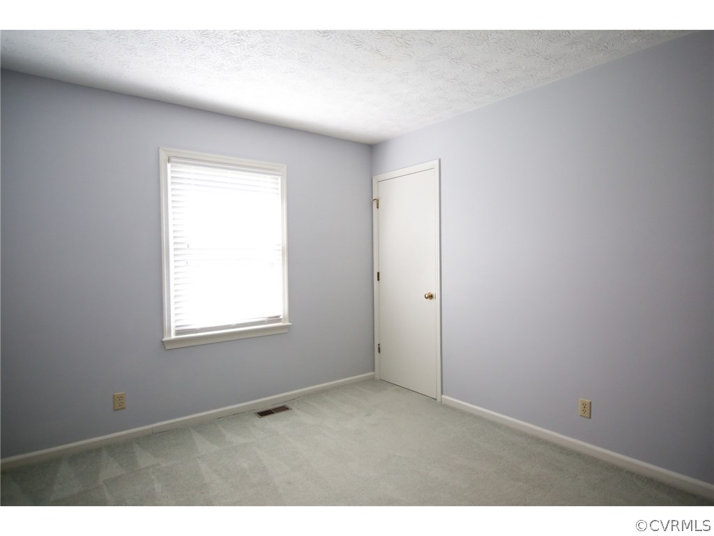 9361 West Bunker Hill Road Rice, VA 23966 - Photo 20 of 39 an empty room with a window