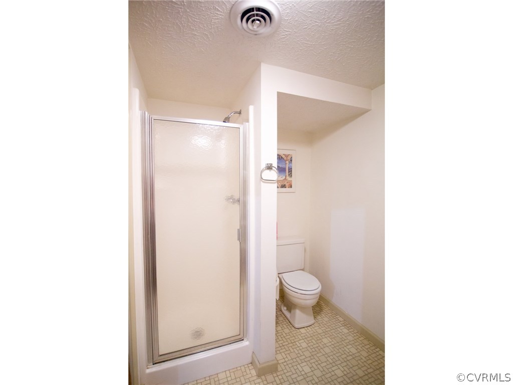 9361 West Bunker Hill Road Rice, VA 23966 - Photo 24 of 39 a bathroom with a toilet