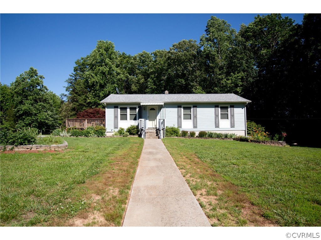 9361 West Bunker Hill Road Rice, VA 23966 - Photo 3 of 39 a front view of a house with a yard