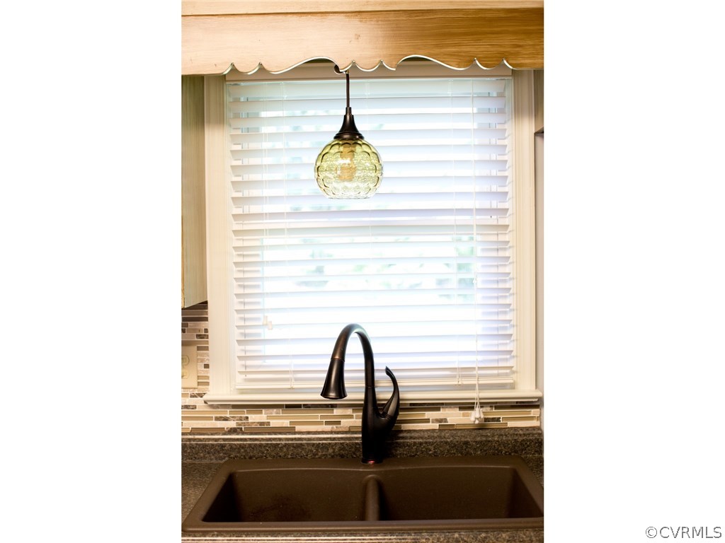 9361 West Bunker Hill Road Rice, VA 23966 - Photo 8 of 39 a close view of a sink and a vanity