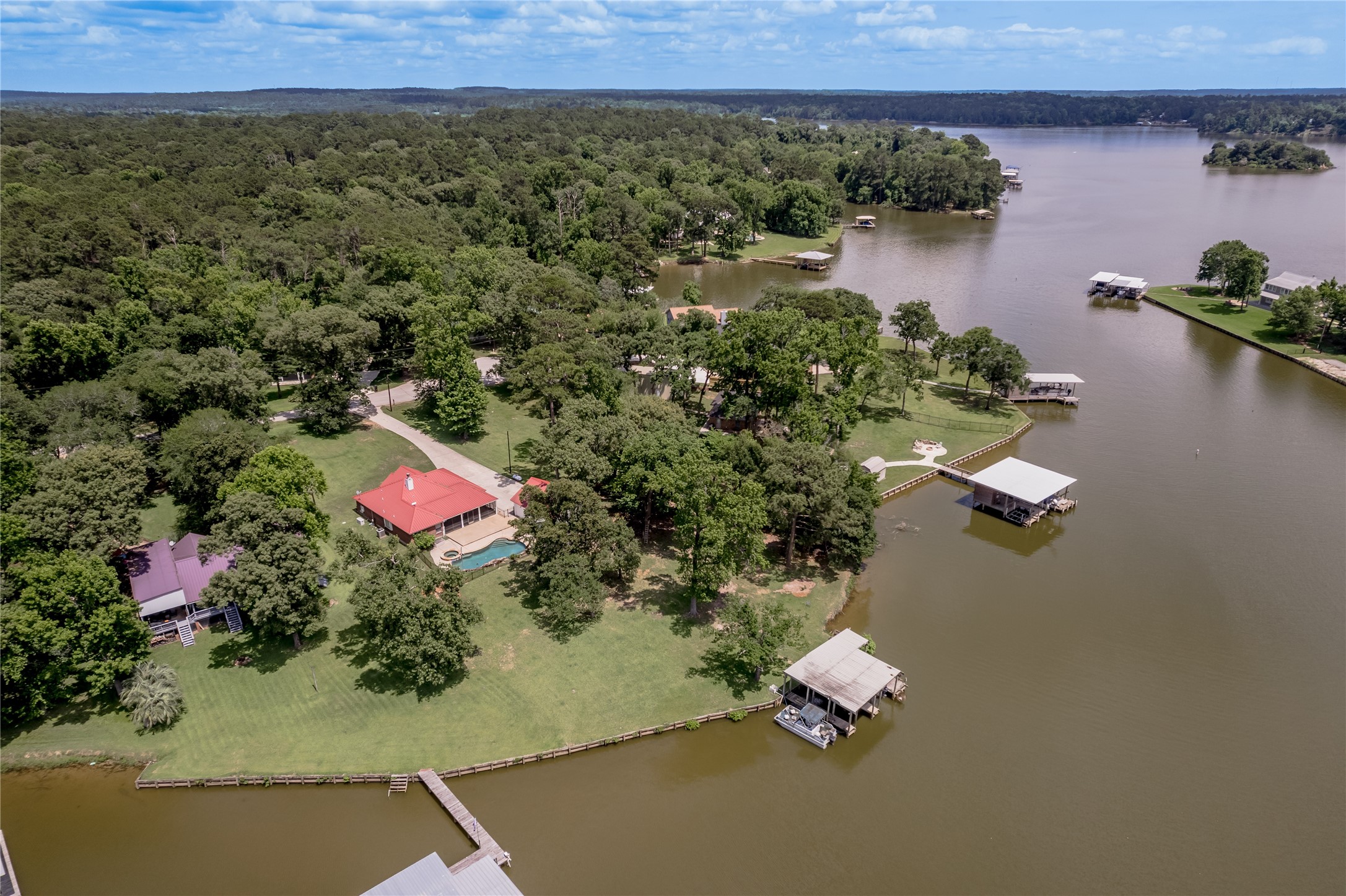 324 Red Oak Lane Trinity, TX 75862 - Photo 45 of 49 an aerial view of a house with a yard and lake view