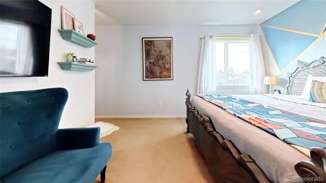 a spacious bathroom with a double vanity sink and mirror