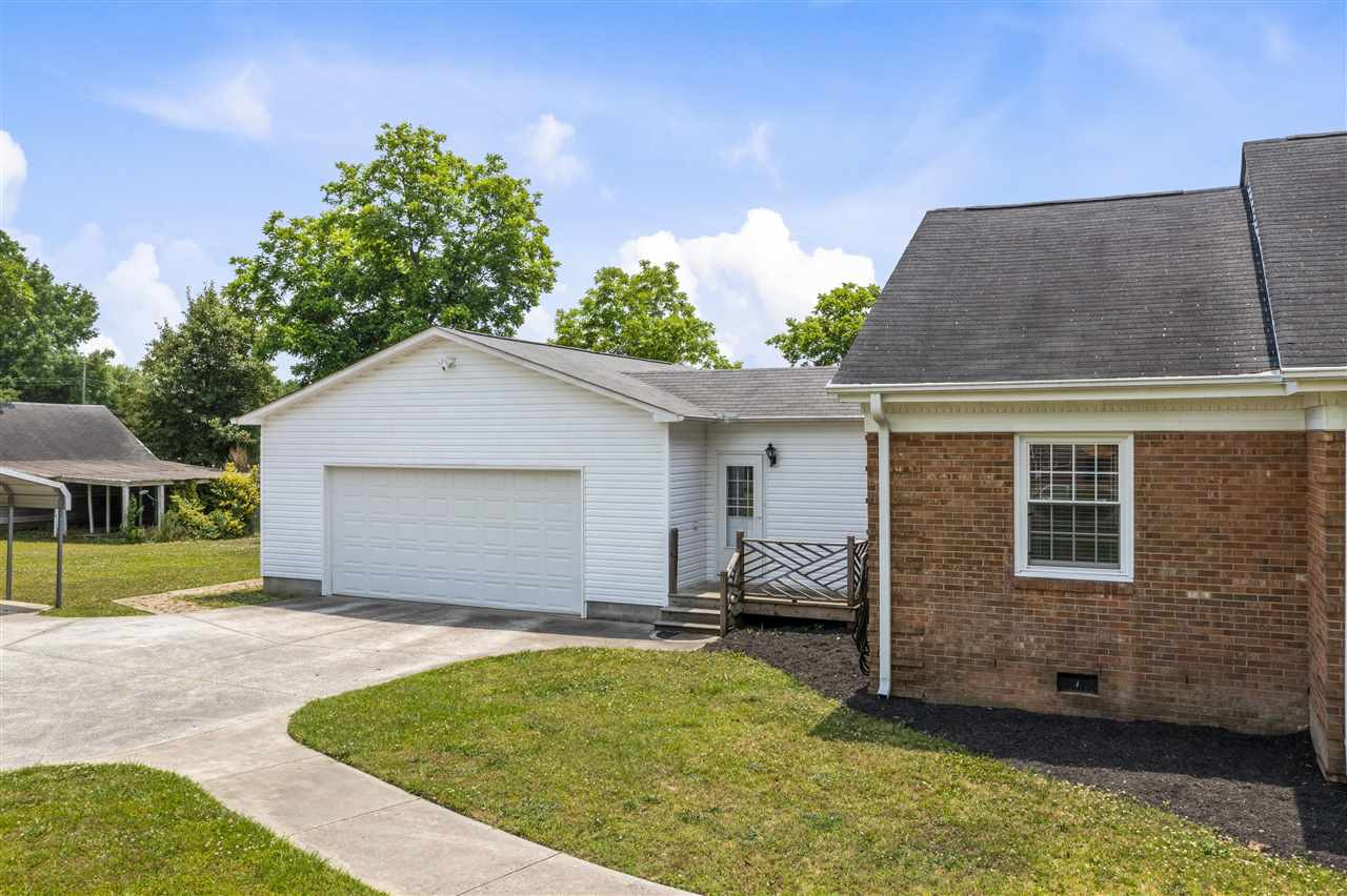2403 Erwin Road Dunn, NC 28334 - Photo 21 of 23 There is ample storage in this oversized double garage that is wired with a 220 plug and 30 amp RV plug! Garage