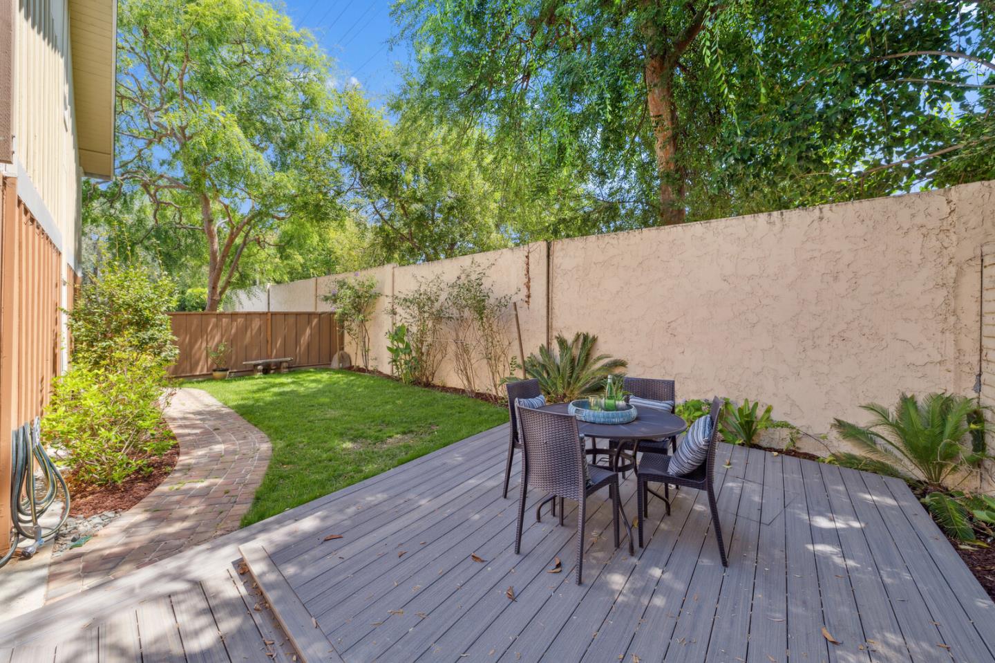 118 Granada Drive Mountain View, CA 94043 - Photo 20 of 28 a view of a backyard with furniture and garden