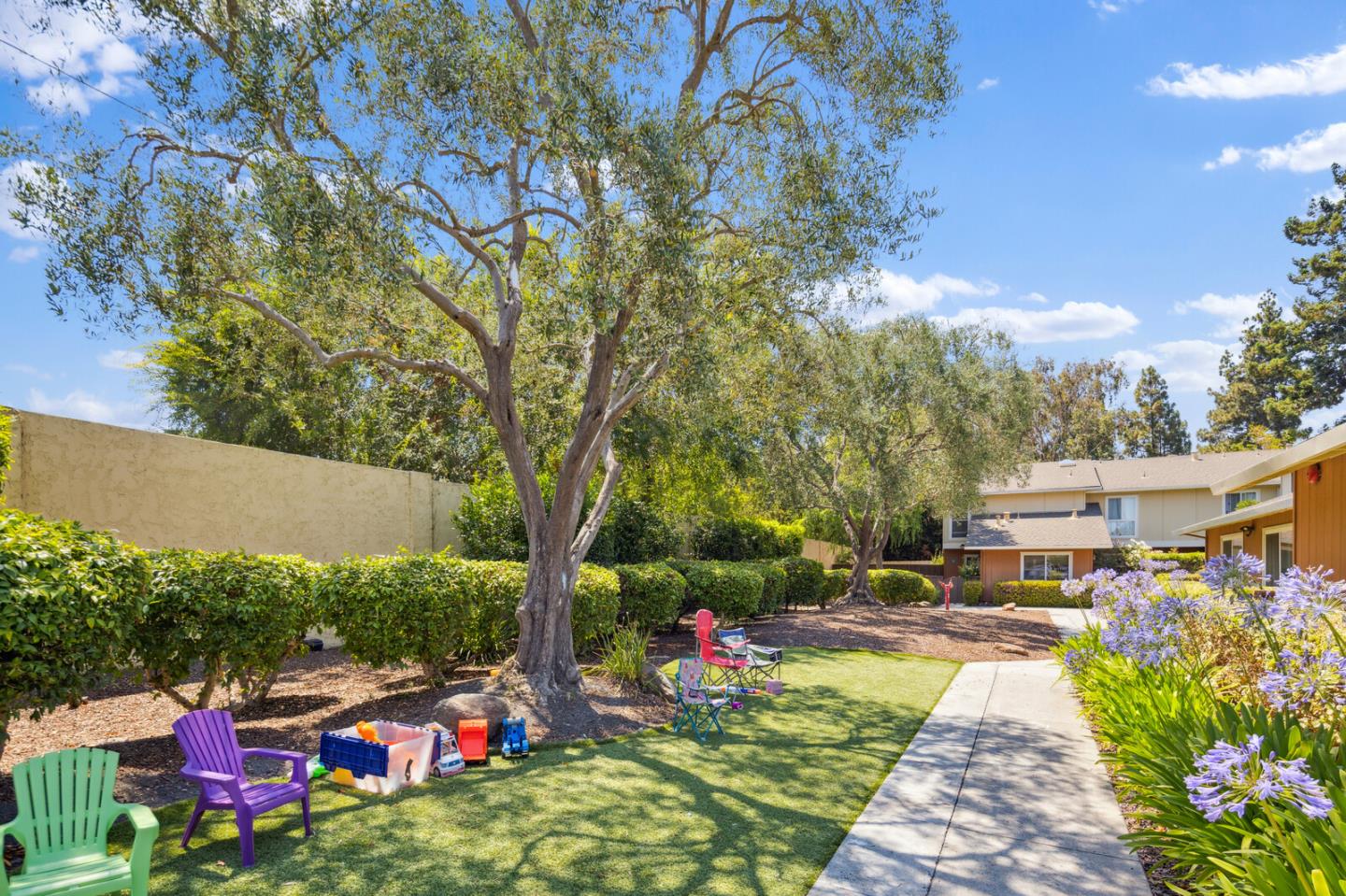 118 Granada Drive Mountain View, CA 94043 - Photo 25 of 28 a childrens park with lots of swings slides and swimming pool