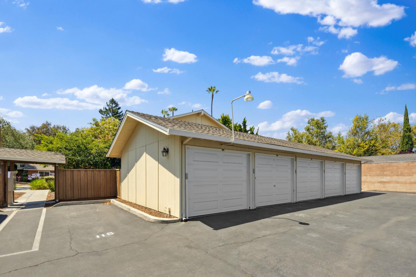 118 Granada Drive Mountain View, CA 94043 - Photo 26 of 28 a view of a house with a yard and garage