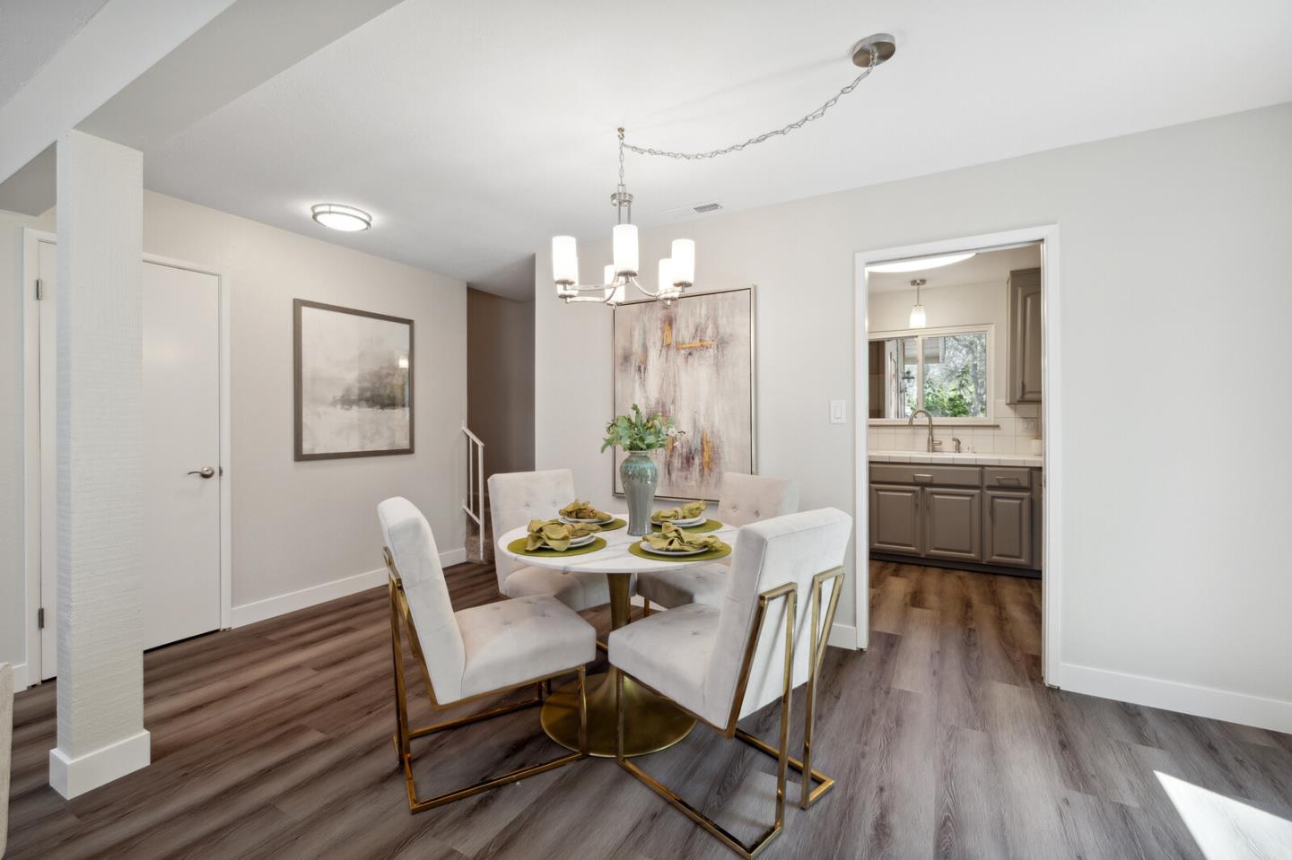 118 Granada Drive Mountain View, CA 94043 - Photo 6 of 28 a view of a dining room with furniture and wooden floor