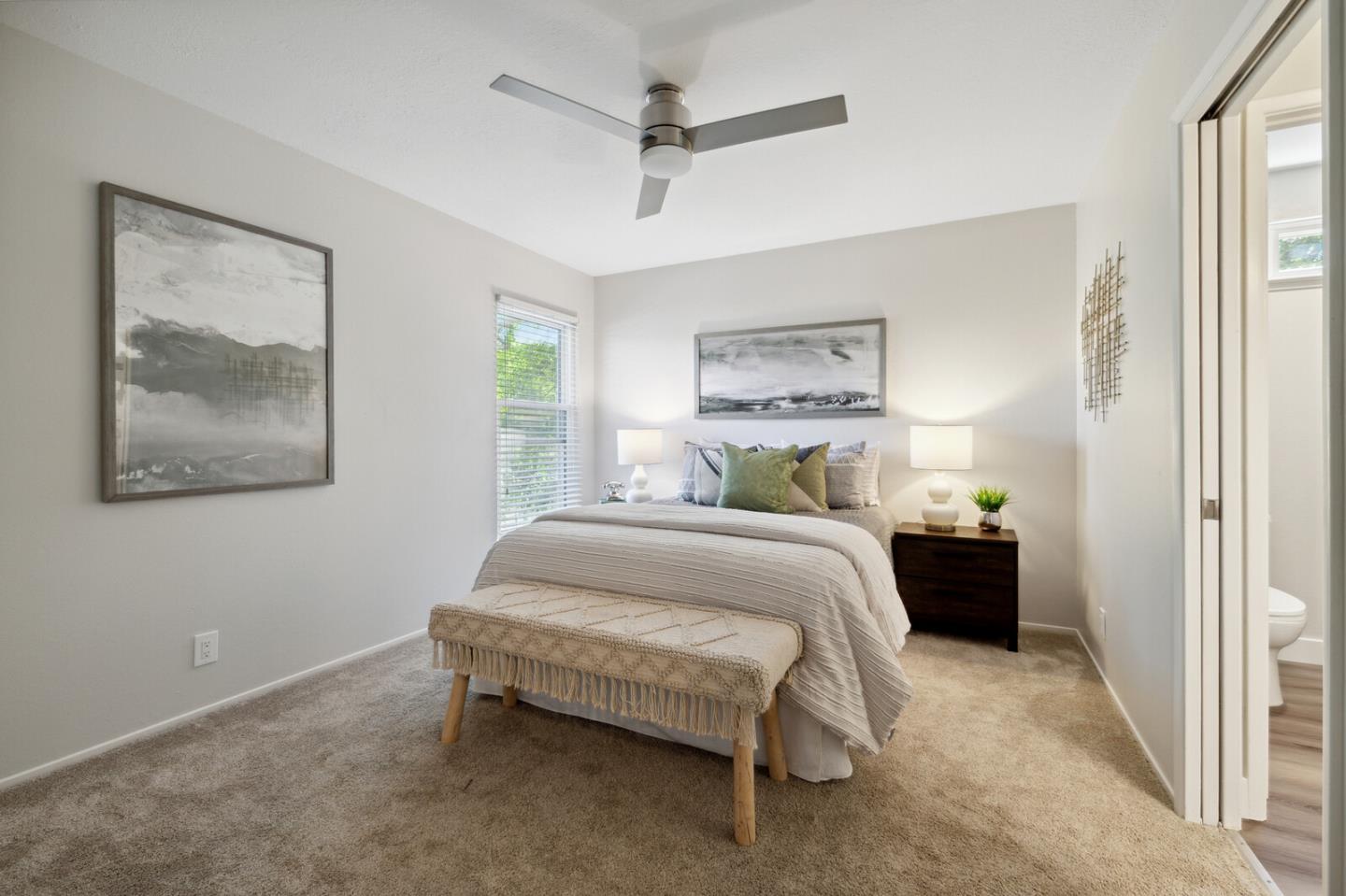 118 Granada Drive Mountain View, CA 94043 - Photo 8 of 28 a bedroom with a bed and a painting on the wall