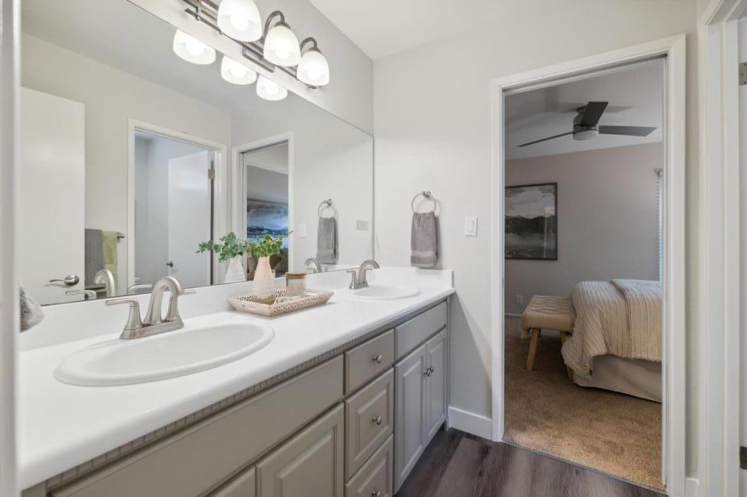 118 Granada Drive Mountain View, CA 94043 - Photo 10 of 28 a en suite bathroom with a double vanity sink and a mirror