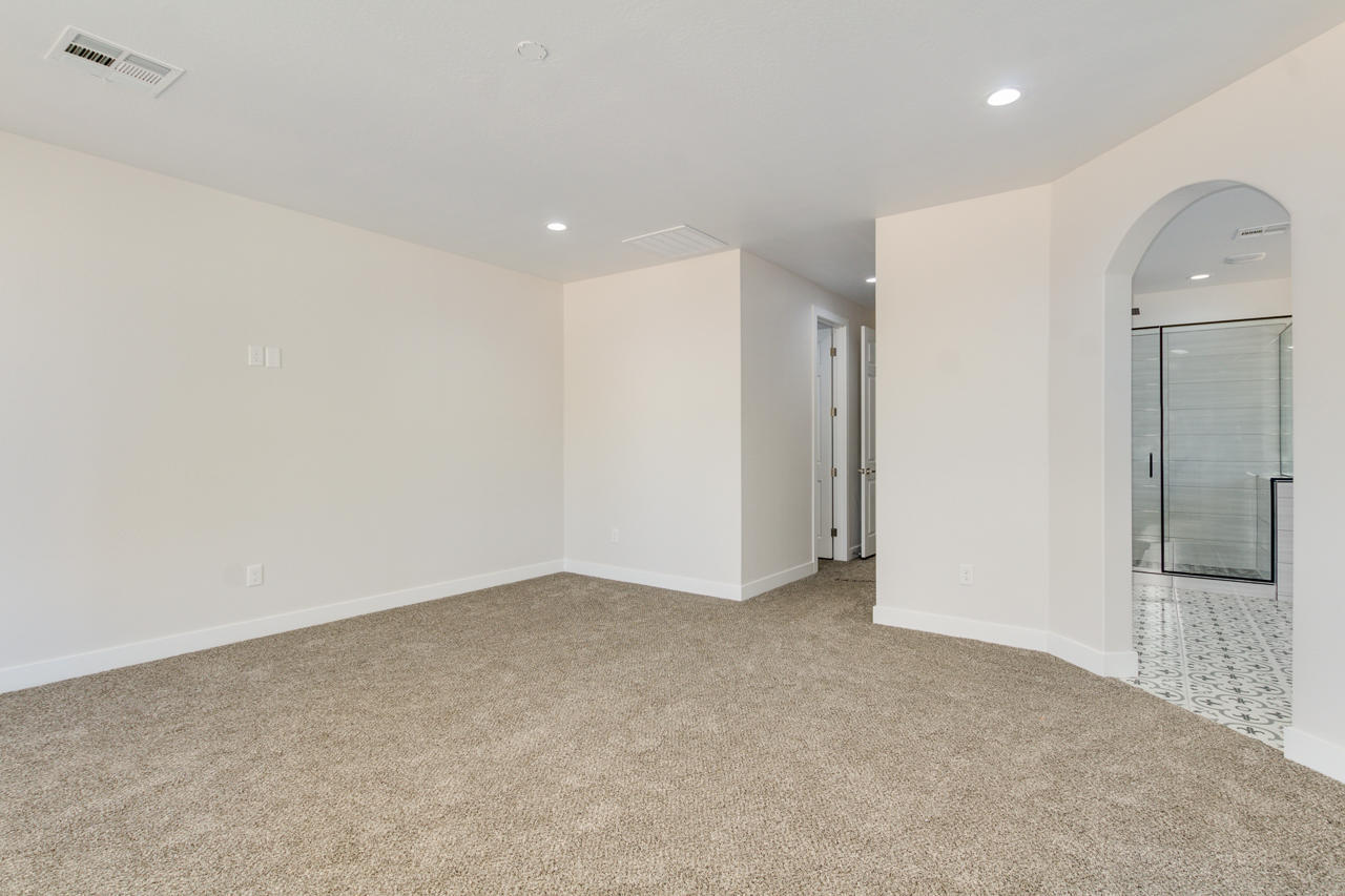 6605 North Citrus Road Waddell, AZ 85355 - Photo 25 of 46 First walk in closet to the left