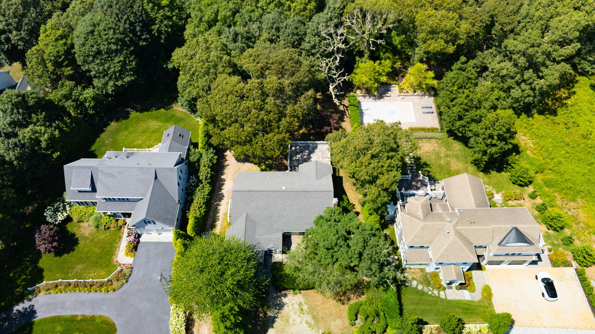 89 Swift Avenue Osterville, MA 02655 - Photo 16 of 57 an aerial view of residential house with outdoor space and swimming pool