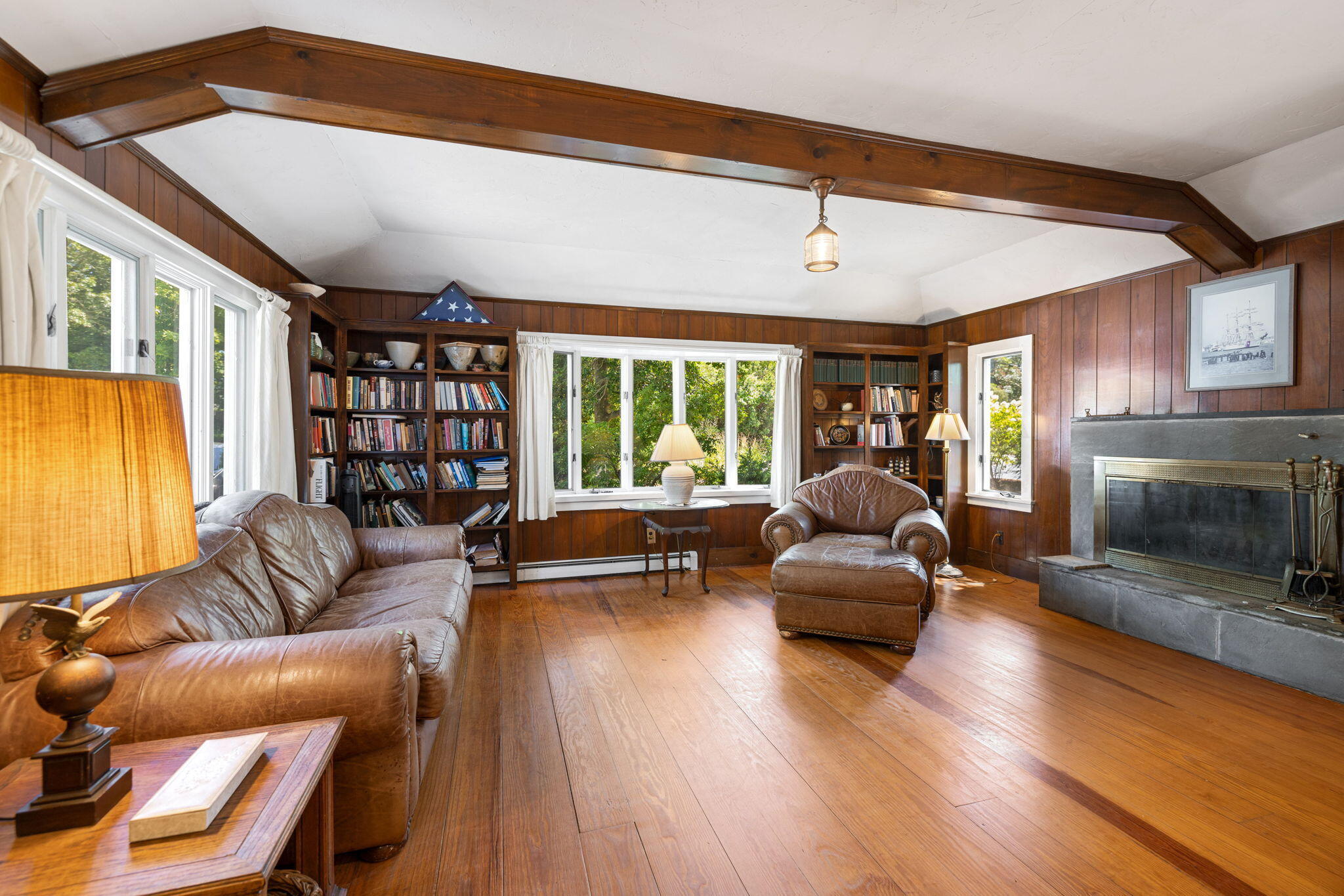 89 Swift Avenue Osterville, MA 02655 - Photo 29 of 57 a living room with furniture and a fireplace
