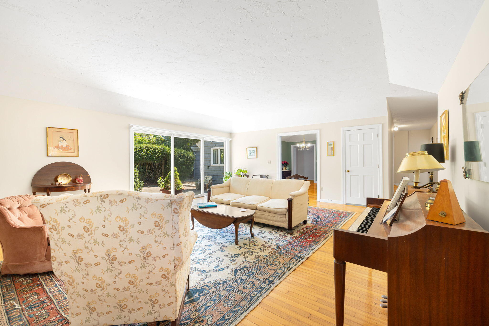 89 Swift Avenue Osterville, MA 02655 - Photo 39 of 57 a living room with furniture gym equipment and a large window