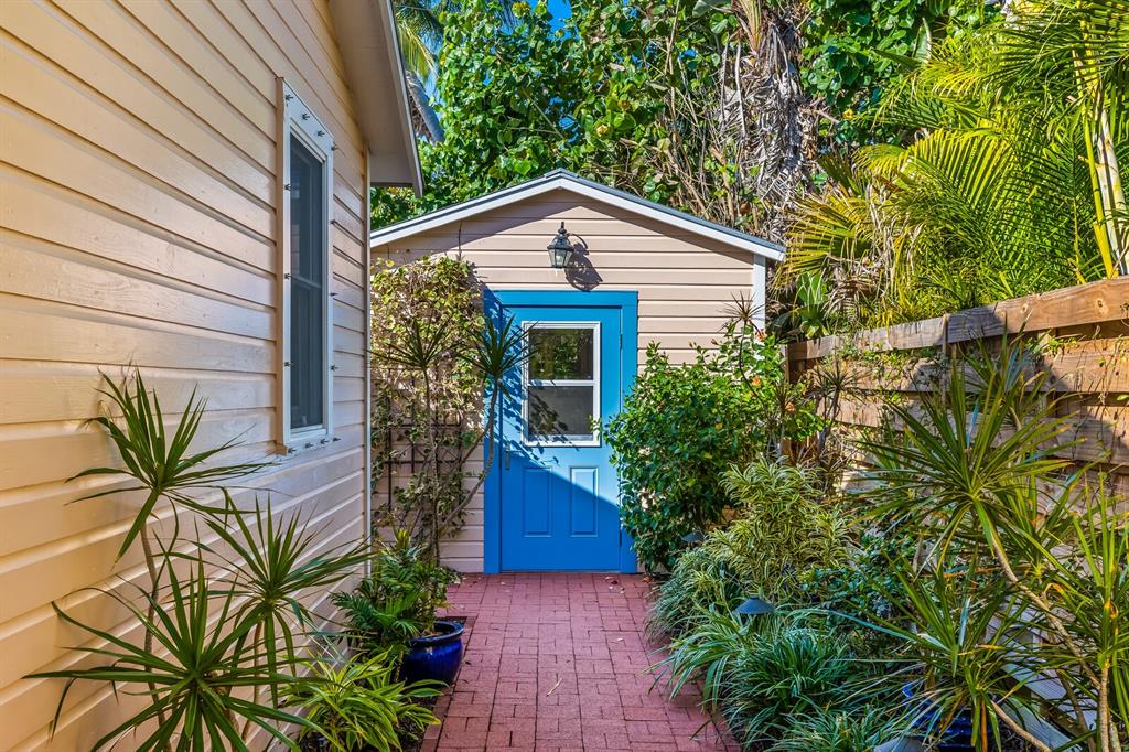 361 Tarpon Avenue Boca Grande, FL 33921 - Photo 19 of 25 a front view of a house with a yard