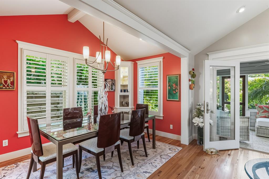 361 Tarpon Avenue Boca Grande, FL 33921 - Photo 8 of 25 a dining room with furniture and wooden floor