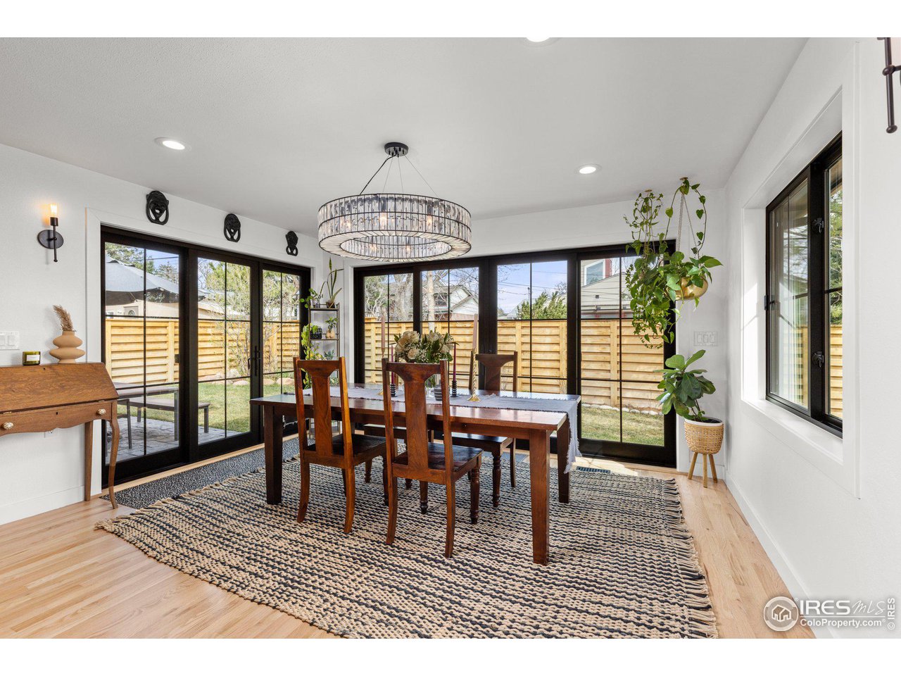 2685 Stephens Road Boulder, CO 80305 - Photo 12 of 40 a view of a dining room with furniture window and wooden floor