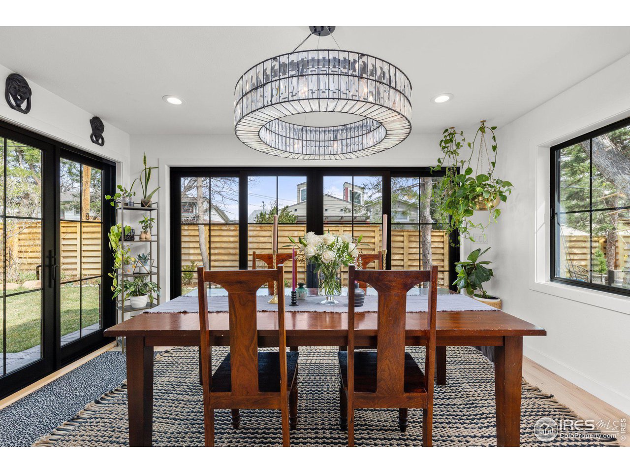 2685 Stephens Road Boulder, CO 80305 - Photo 13 of 40 a view of a dining room with furniture window and wooden floor