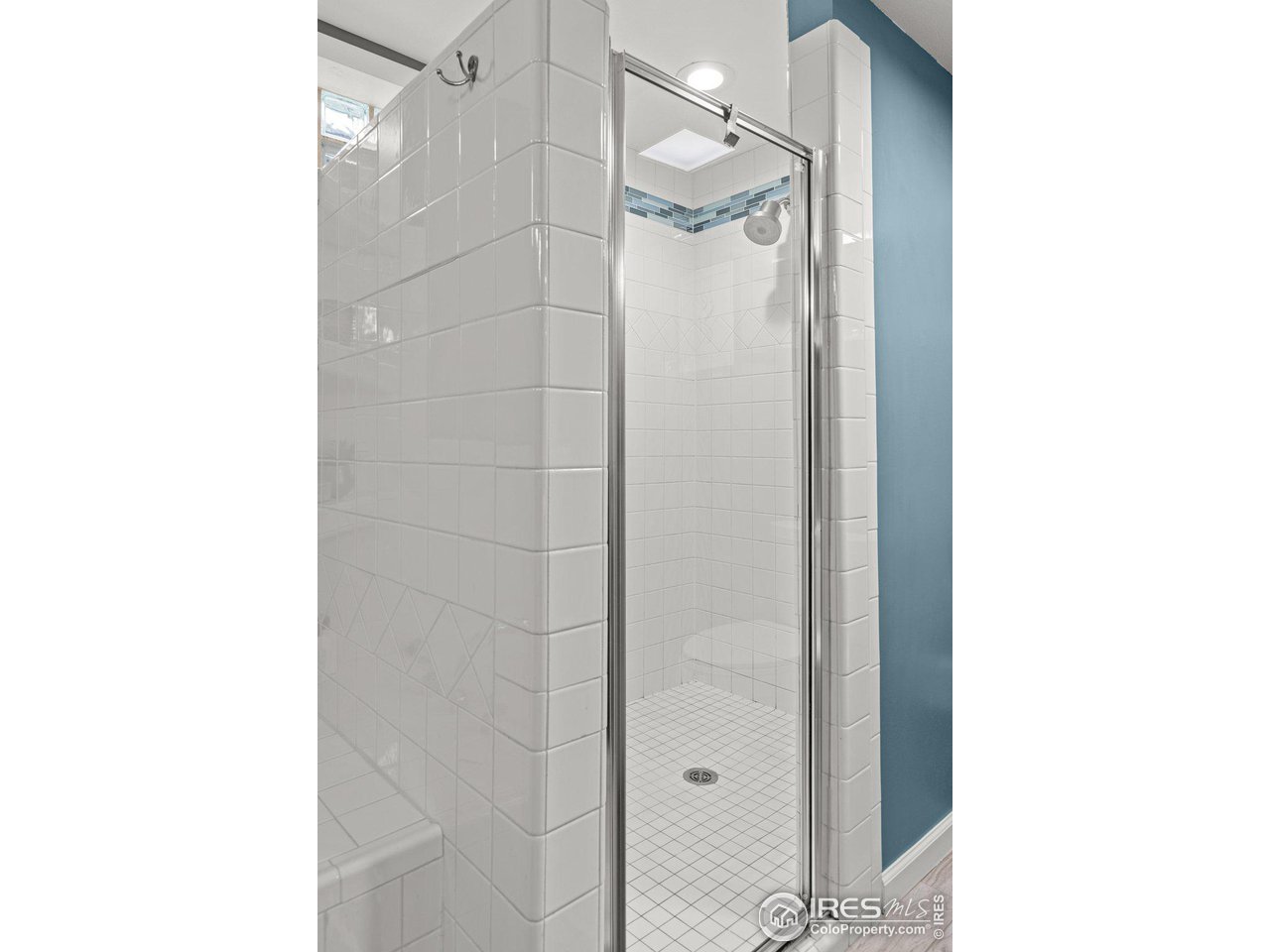 2685 Stephens Road Boulder, CO 80305 - Photo 18 of 40 a bathroom with a shower and a mirror