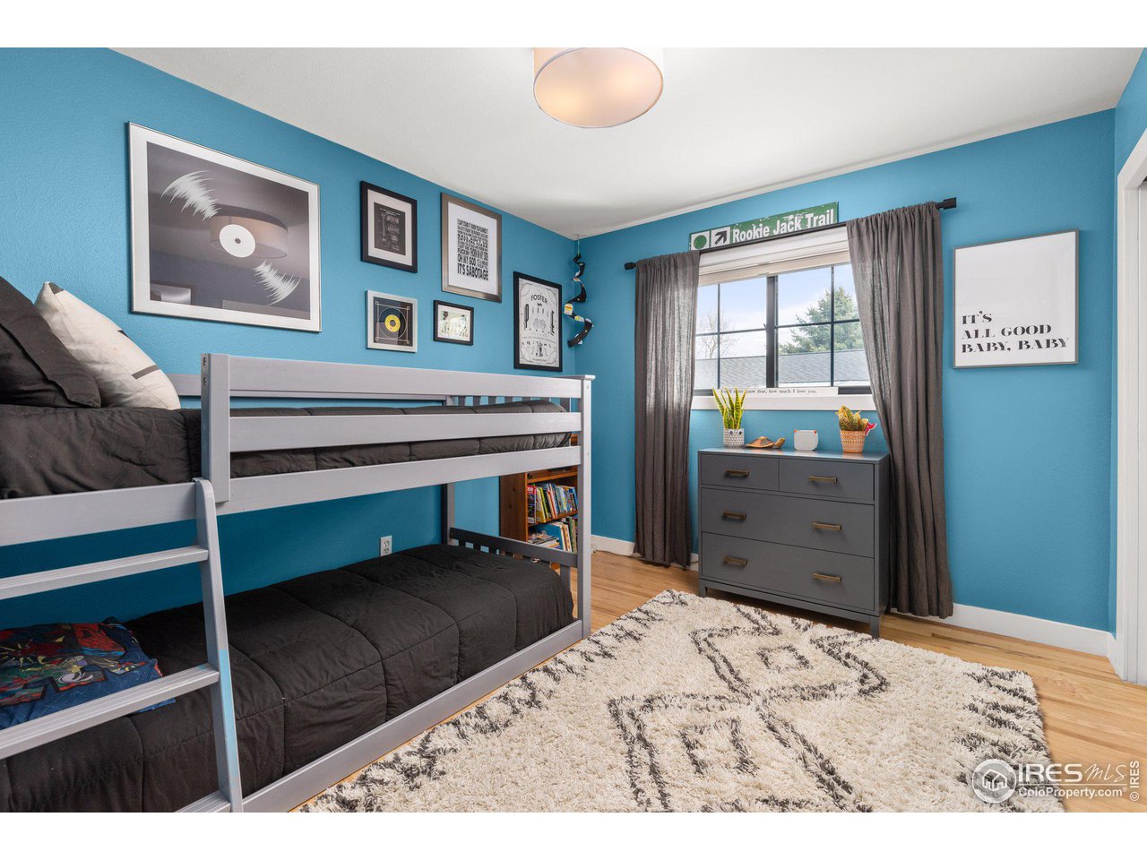 2685 Stephens Road Boulder, CO 80305 - Photo 25 of 40 a bedroom with a bed and a dresser