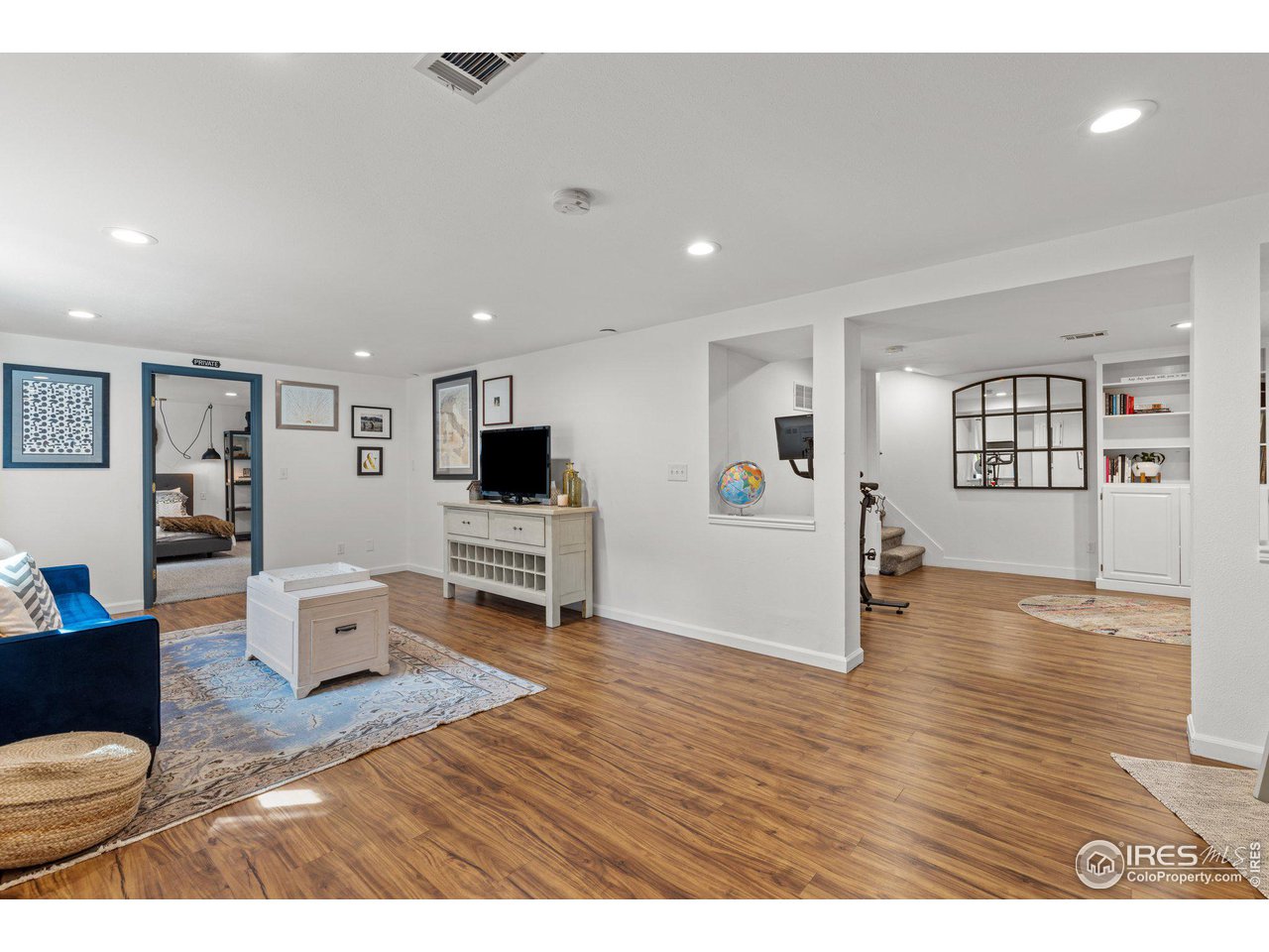 2685 Stephens Road Boulder, CO 80305 - Photo 27 of 40 a living room with furniture and a wooden floor