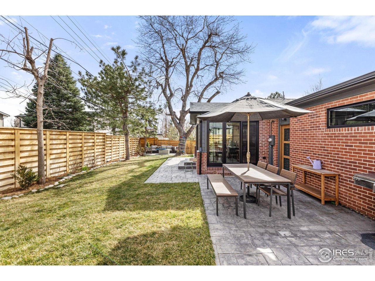 2685 Stephens Road Boulder, CO 80305 - Photo 30 of 40 a view of a house with backyard porch and sitting area