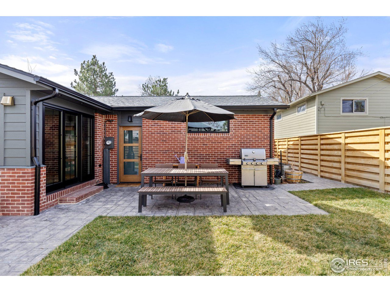 2685 Stephens Road Boulder, CO 80305 - Photo 31 of 40 a view of a house with backyard and sitting area