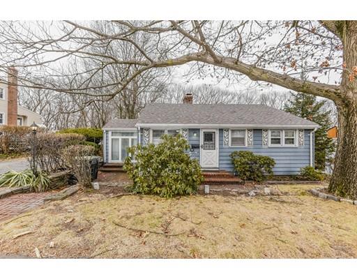 360 Sprague Street Dedham, MA 02026 - Photo 1 of 19 a view of a house with a yard covered in snow