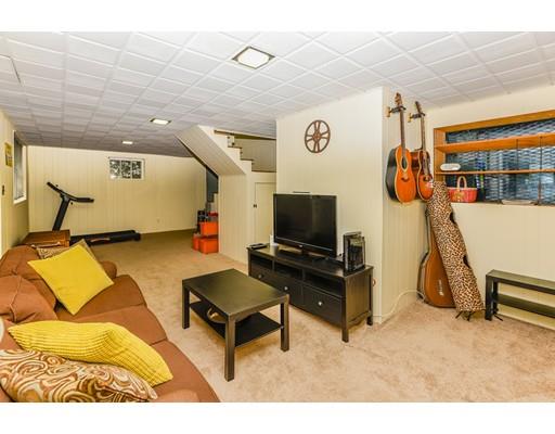 360 Sprague Street Dedham, MA 02026 - Photo 12 of 19 a living room with furniture and a flat screen tv