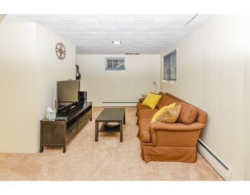 360 Sprague Street Dedham, MA 02026 - Photo 13 of 19 a living room with furniture and a flat screen tv