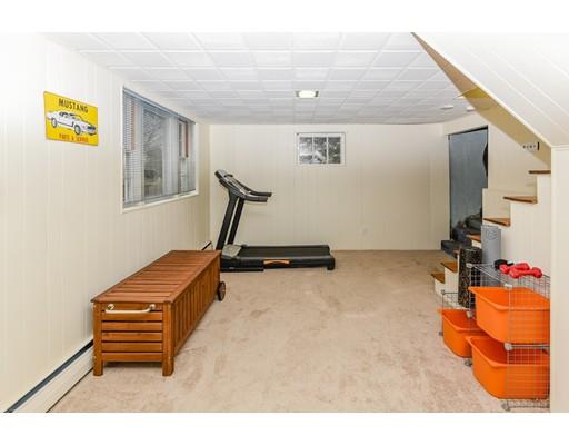 360 Sprague Street Dedham, MA 02026 - Photo 14 of 19 a room with gym equipment and a wooden floor