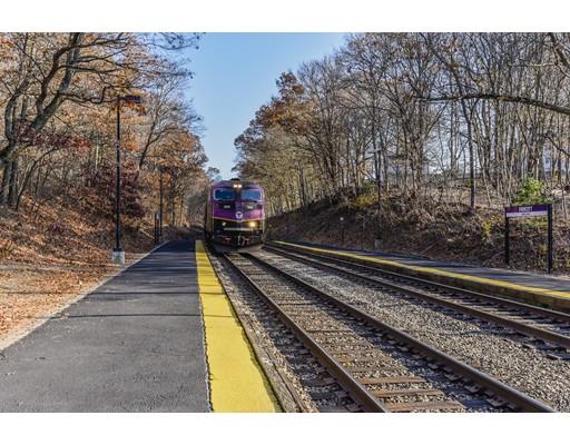360 Sprague Street Dedham, MA 02026 - Photo 17 of 19 a view of a back yard of the house
