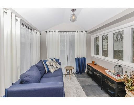 360 Sprague Street Dedham, MA 02026 - Photo 6 of 19 a living room with furniture and a window