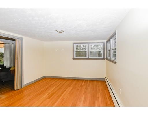 360 Sprague Street Dedham, MA 02026 - Photo 7 of 19 a view of empty room with wooden floor