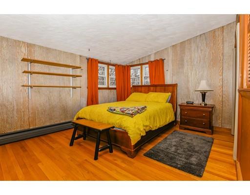 360 Sprague Street Dedham, MA 02026 - Photo 9 of 19 a bedroom with a bed closet and a rug