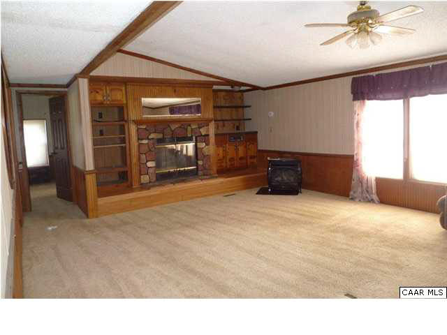 2034 North Boston Road Troy, VA 22974 - Photo 7 of 32 Living room has wood burning fireplace