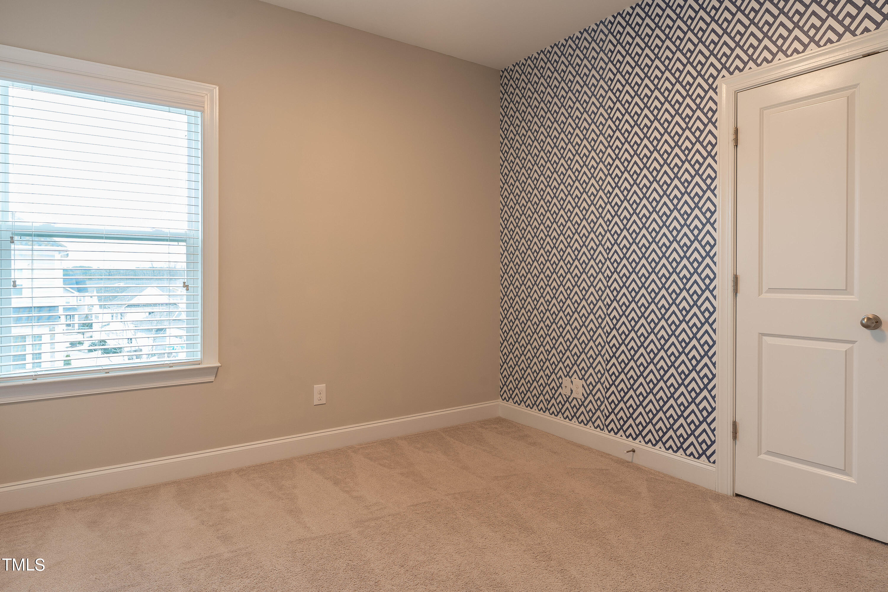 665 Old Dairy Drive Wake Forest, NC 27587 - Photo 15 of 30 an empty room with wooden floor