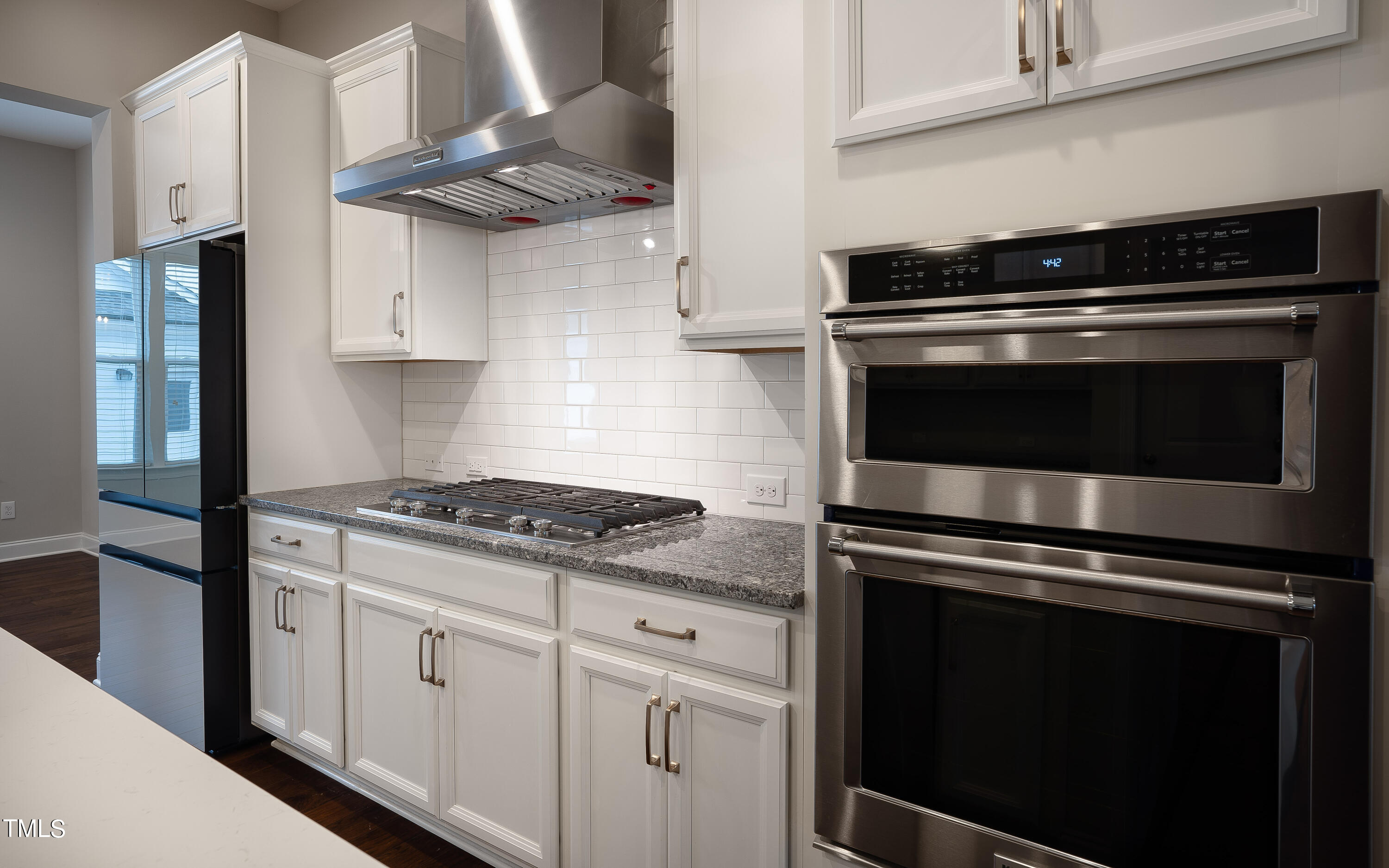 665 Old Dairy Drive Wake Forest, NC 27587 - Photo 10 of 30 a stove top oven sitting inside of a kitchen