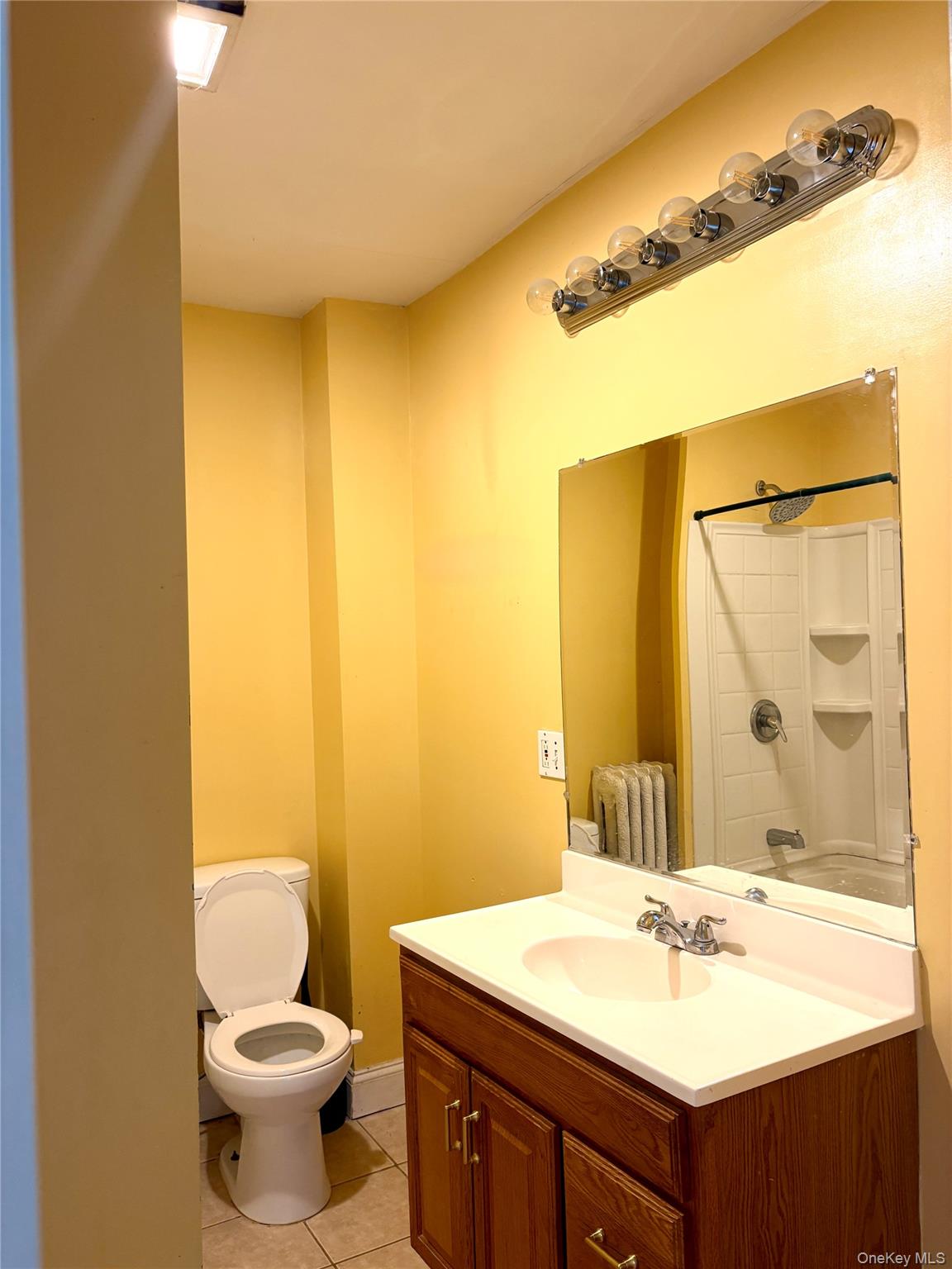2 Morris Avenue, Unit 203 Cold Spring, NY 10516 - Photo 12 of 32 a bathroom with a sink and a mirror