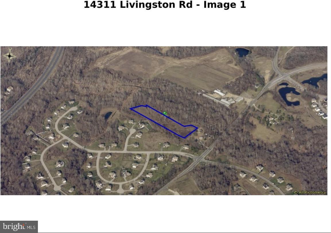 14311 Livingston Road Accokeek, MD 20607 - Photo 3 of 7 a black and white photo of a book