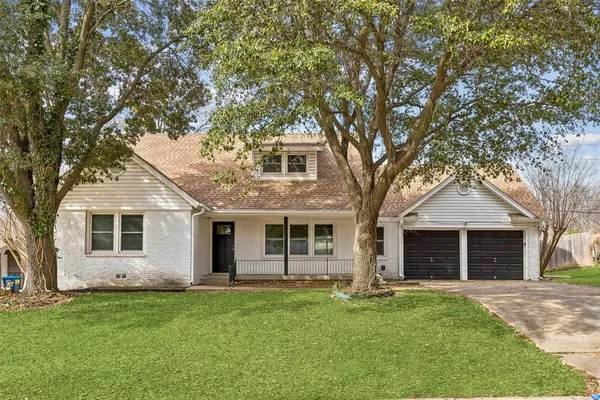 front view of a house and a yard