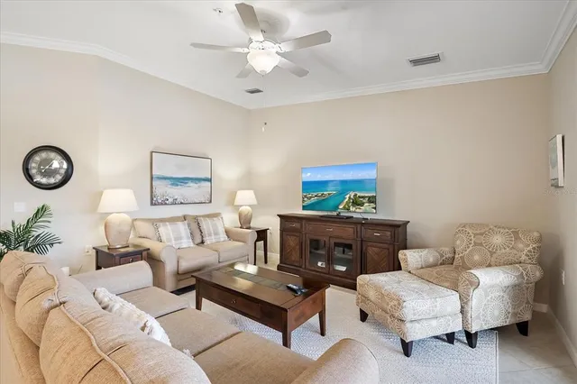 a living room with furniture a rug and a fireplace