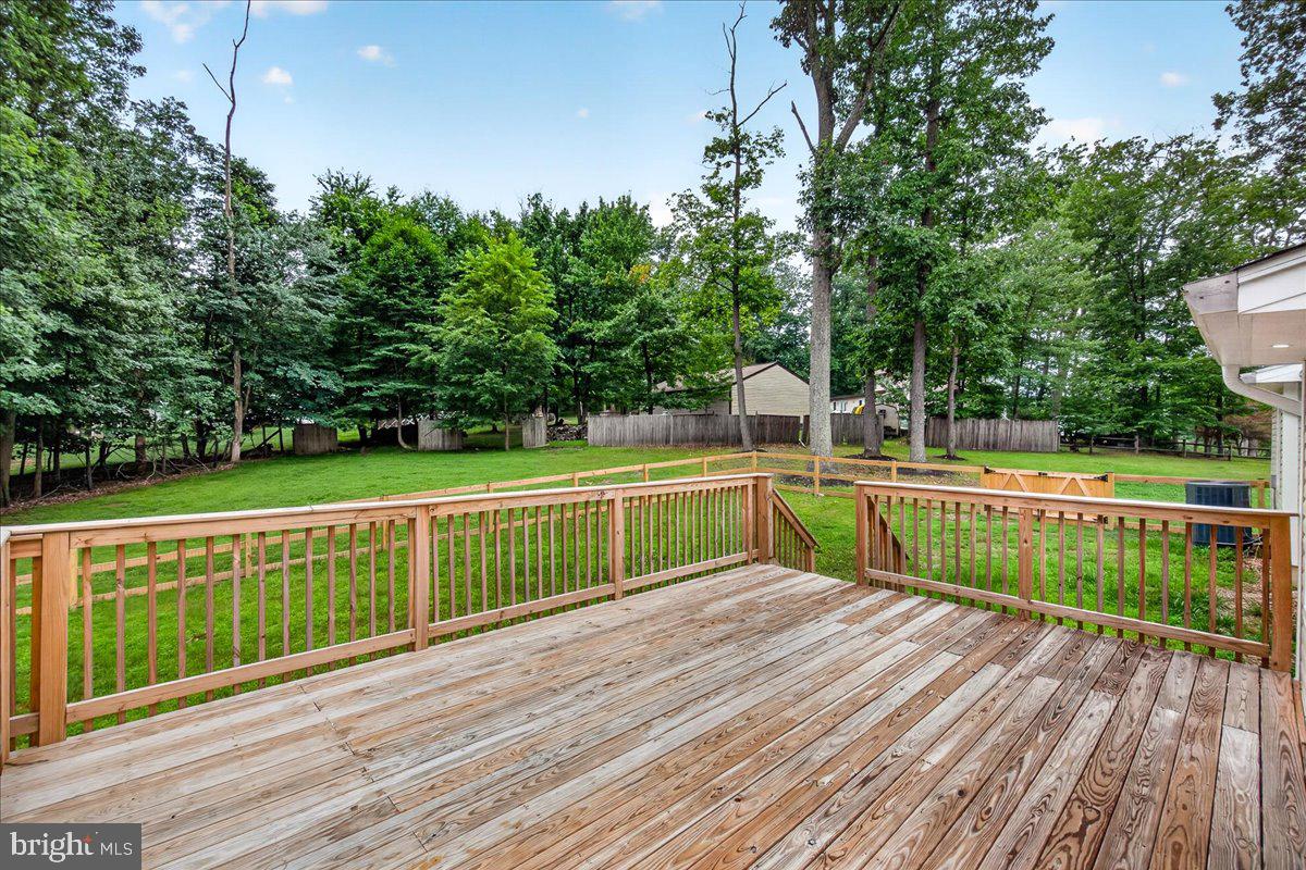 2683 Walston Road Mount Airy, MD 21771 - Photo 21 of 62 Serene backyard retreat with lush greenery.