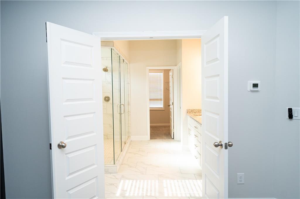 536 Sageton Court Grayson, GA 30017 - Photo 22 of 37 a view of a bathroom with a shower
