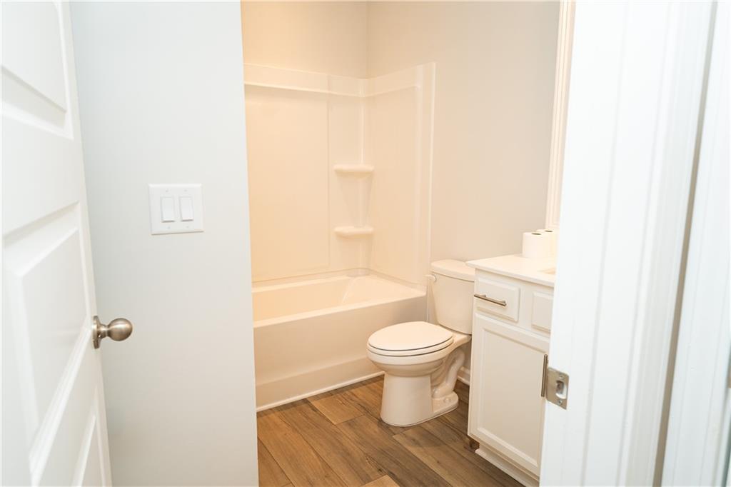 536 Sageton Court Grayson, GA 30017 - Photo 10 of 37 a bathroom with a sink toilet and shower