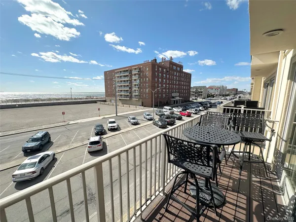 a view of balcony with furniture