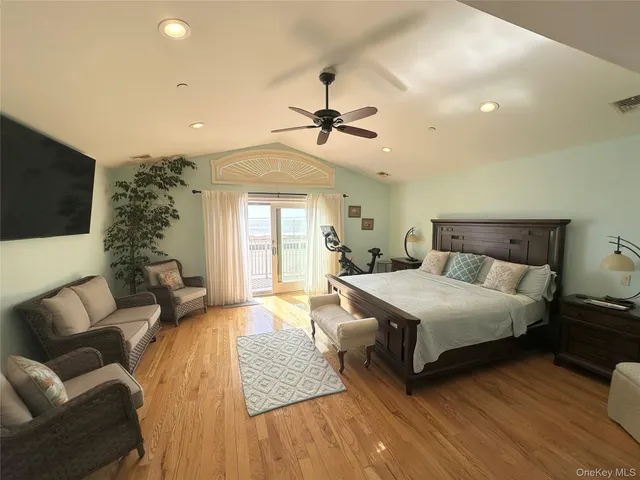 a view of a chairs and table in the balcony