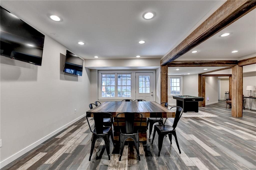 7051 Dove Point Lane Hoschton, GA 30548 - Photo 49 of 74 a view of a dining room with furniture