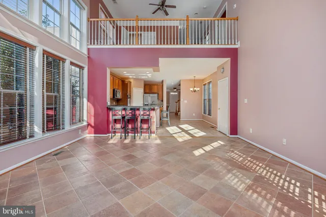 a view of a house with porch and furniture